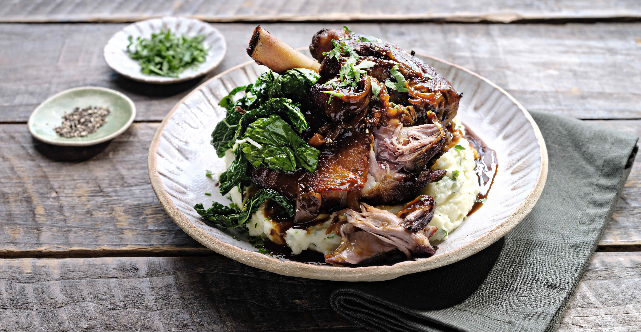 Irish Stout Braised Lamb Shanks with Cheesy Mashed Potatoes and Sautéed Kale